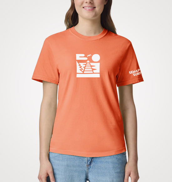 Model wearing the melon Semaphore Surf Co. icon and sleeve tee with the white jetty icon on the chest