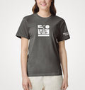 Model wearing the pepper Semaphore Surf Co. icon and sleeve tee with the white jetty icon on the chest