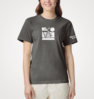Model wearing the pepper Semaphore Surf Co. icon and sleeve tee with the white jetty icon on the chest